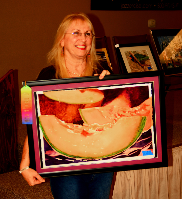 Susan with her painting of slied cantalope